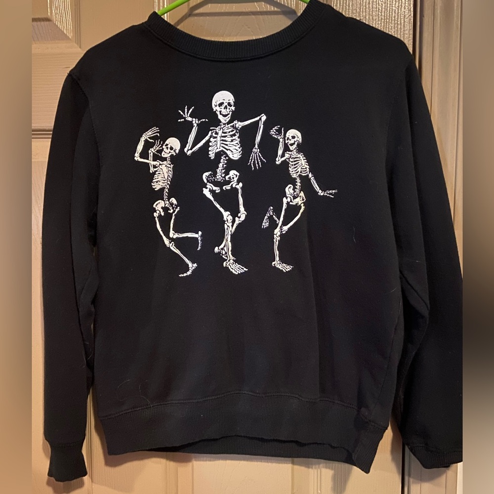 Pull over with dancing skeletons, black and white, size small, good for warmth